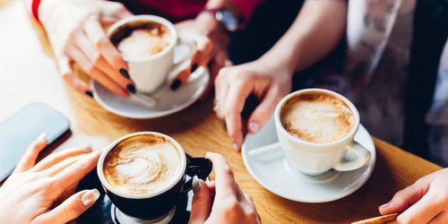 three cups of coffee on the table